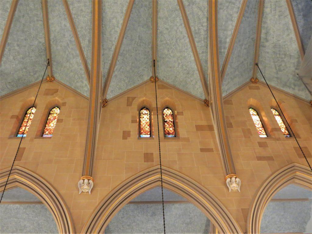 Egan Church Restorations faux stone finishes on walls. Rag roll painting on ceilings faux stone painting, church painter, church painting, Middletown CT