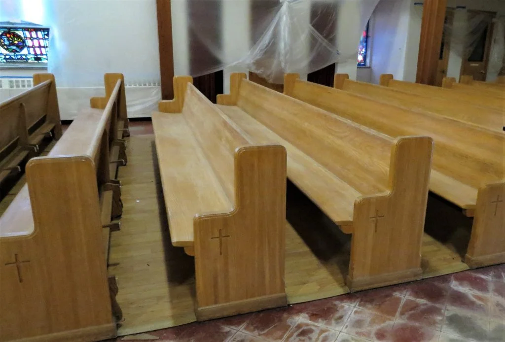 Egan Church Restorations church pew refinishing before pew refinishing, pew repair, wood pew refinishing